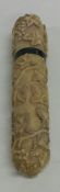 An Antique ivory snuff box decorated with vines an