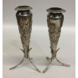 A pair of Chinese silver tapering spill vases with