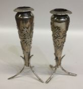 A pair of Chinese silver tapering spill vases with