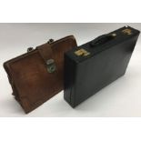 An old Harrods leather briefcase together with one other.