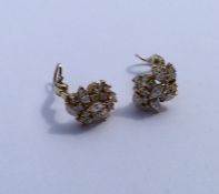 A pair of good quality diamond cluster earrings in