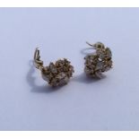 A pair of good quality diamond cluster earrings in