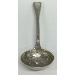 A Georgian silver sifter ladle with gilt bowl. Lon