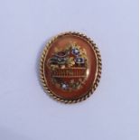 A good quality oval hard stone brooch decorated wi