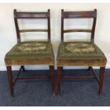 A pair of Georgian mahogany hoop back chairs. Est.