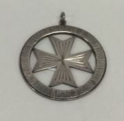 A novelty silver pendant of textured form. Approx.