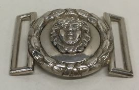 A Georgian silver buckle with leaf decoration. App