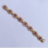 An attractive 9 carat amethyst bracelet with conce
