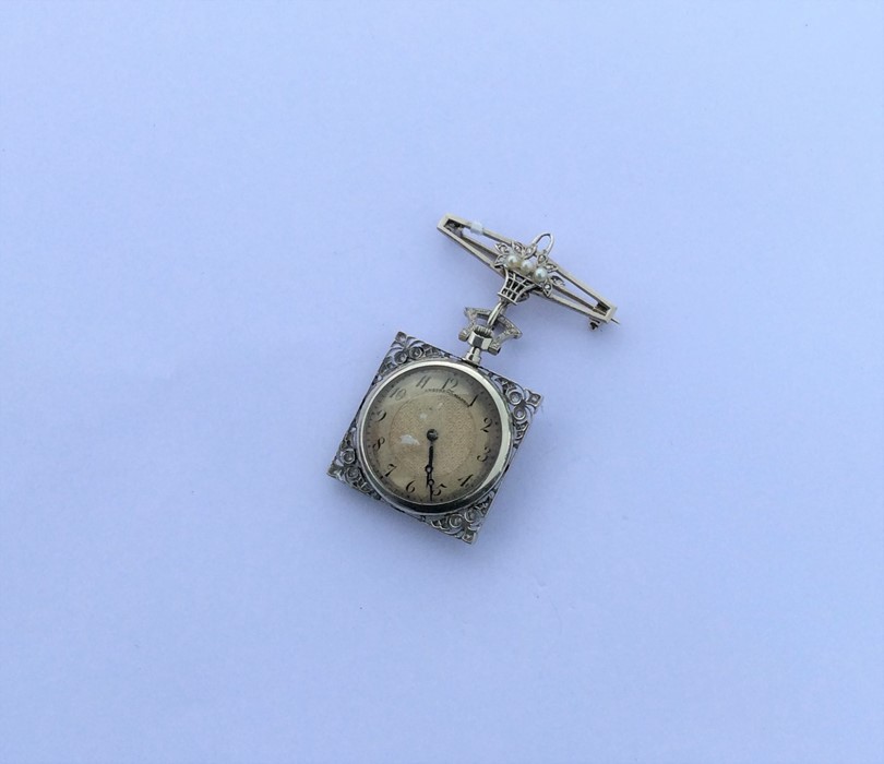A heavy French lady's nurse's watch decorated with