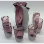 A stylish amethyst glass lemonade set. Est. £25 -