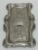 A modern silver rectangular pin dish decorated wit