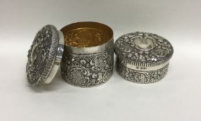 A pair of quality silver dressing table jars attra