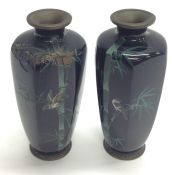 A pair of Japanese cloisonné vases decorated with