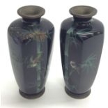 A pair of Japanese cloisonné vases decorated with