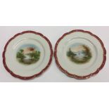 A pair of English hand painted cabinet plates with