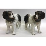 A pair of early Staffordshire dogs with textured b