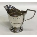 A small silver Georgian style cream jug. Birmingha