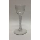 A good Georgian air twist glass decorated with scr