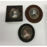A group of three oval miniatures in wooden mounted