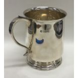 A large heavy silver pint mug on spreading base. Sheffield
