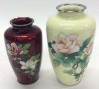 Two Japanese cloisonné vases decorated with flower