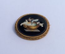 A large Italian micro-mosaic brooch in gold frame