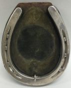 An unusual silver pocket watch mount in the form o