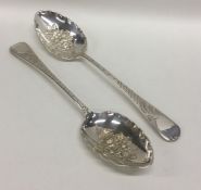 EXETER: A pair of silver berry spoons decorated wi