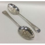 EXETER: A pair of silver berry spoons decorated wi