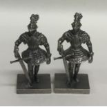A pair of good quality cast silver models of medie