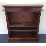 A small mahogany tall bookcase. Est. £30 - £50.