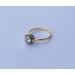 A good diamond single stone mounted as a ring in t