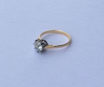A good diamond single stone mounted as a ring in t