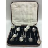 A boxed set of six silver bean top coffee spoons t