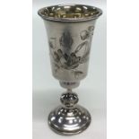 A small Russian silver tapering vase decorated wit