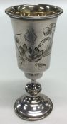 A small Russian silver tapering vase decorated wit
