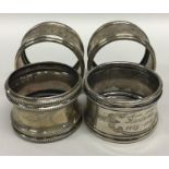 A set of four massive silver napkin rings with bea