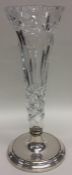 A modern silver tapering spill vase with cut glass