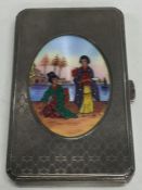 An unusual silver cigarette box, the front attract