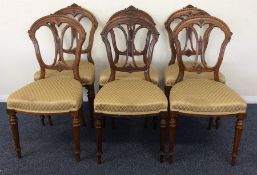 A set of six late Victorian dining chairs with uph