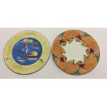 A Wedgwood plate painted with stylised flowers and