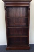 A large mahogany tall bookcase. Est. £50 - £80.