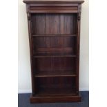 A large mahogany tall bookcase. Est. £50 - £80.