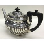A small silver bachelor's half fluted teapot. Birm