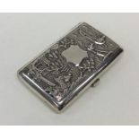 A heavy Chinese silver cigarette case decorated wi