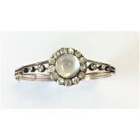 A good quality Victorian moonstone and diamond hin