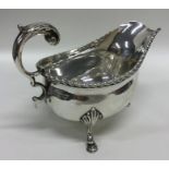 A Georgian style silver sauce boat with gadroon ri