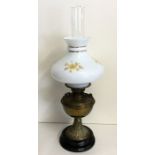 A brass mounted oil lamp on tapering base. Est. £3
