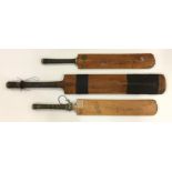 Three old cricket bats. Est. £20 - £30.