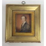 A gilt framed miniature of a gentleman. Est. £25 -